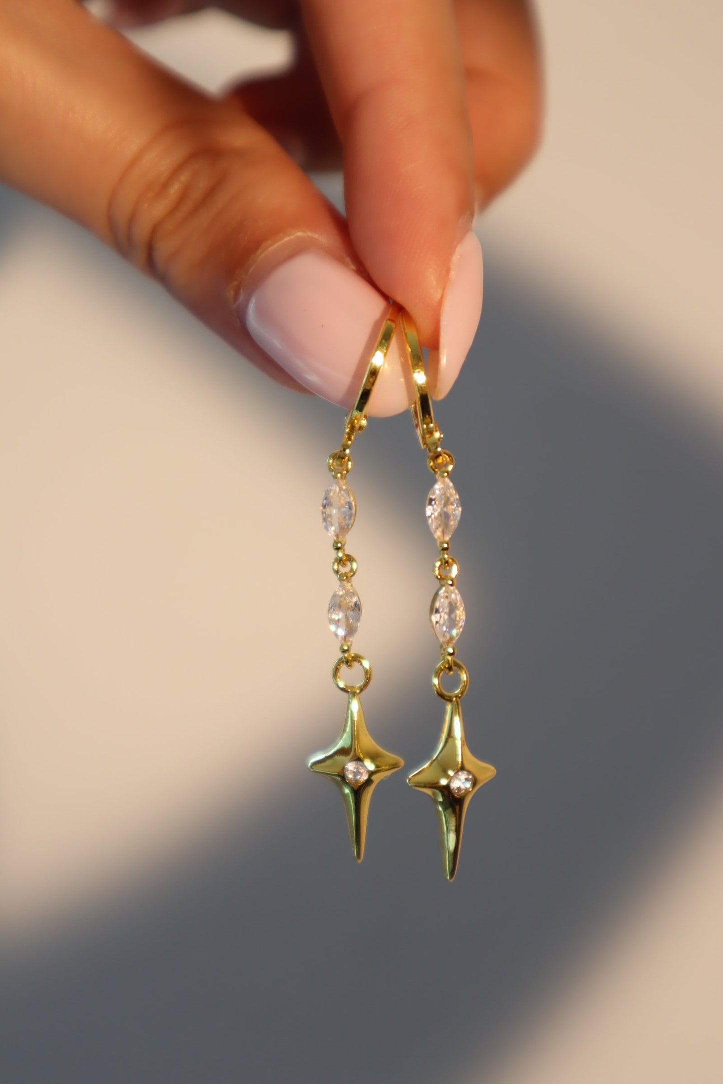 Dangly 18K Gold Star Plated Earrings