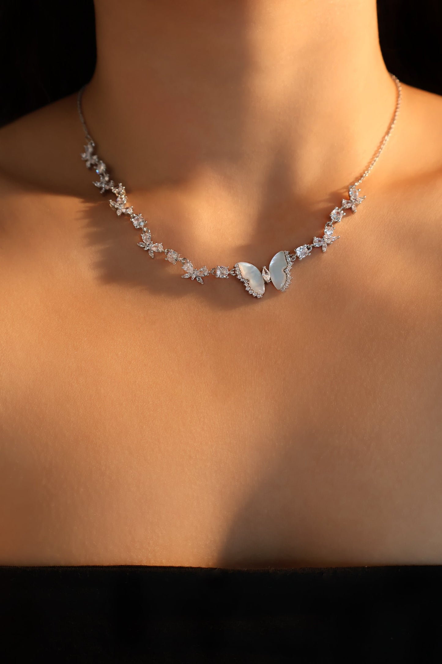 Elara Butterfly Diamanté Necklace (gold & silver)