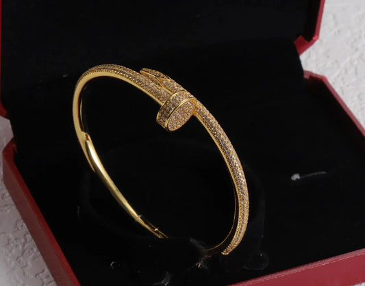 Sleek Gold Nail Bracelet